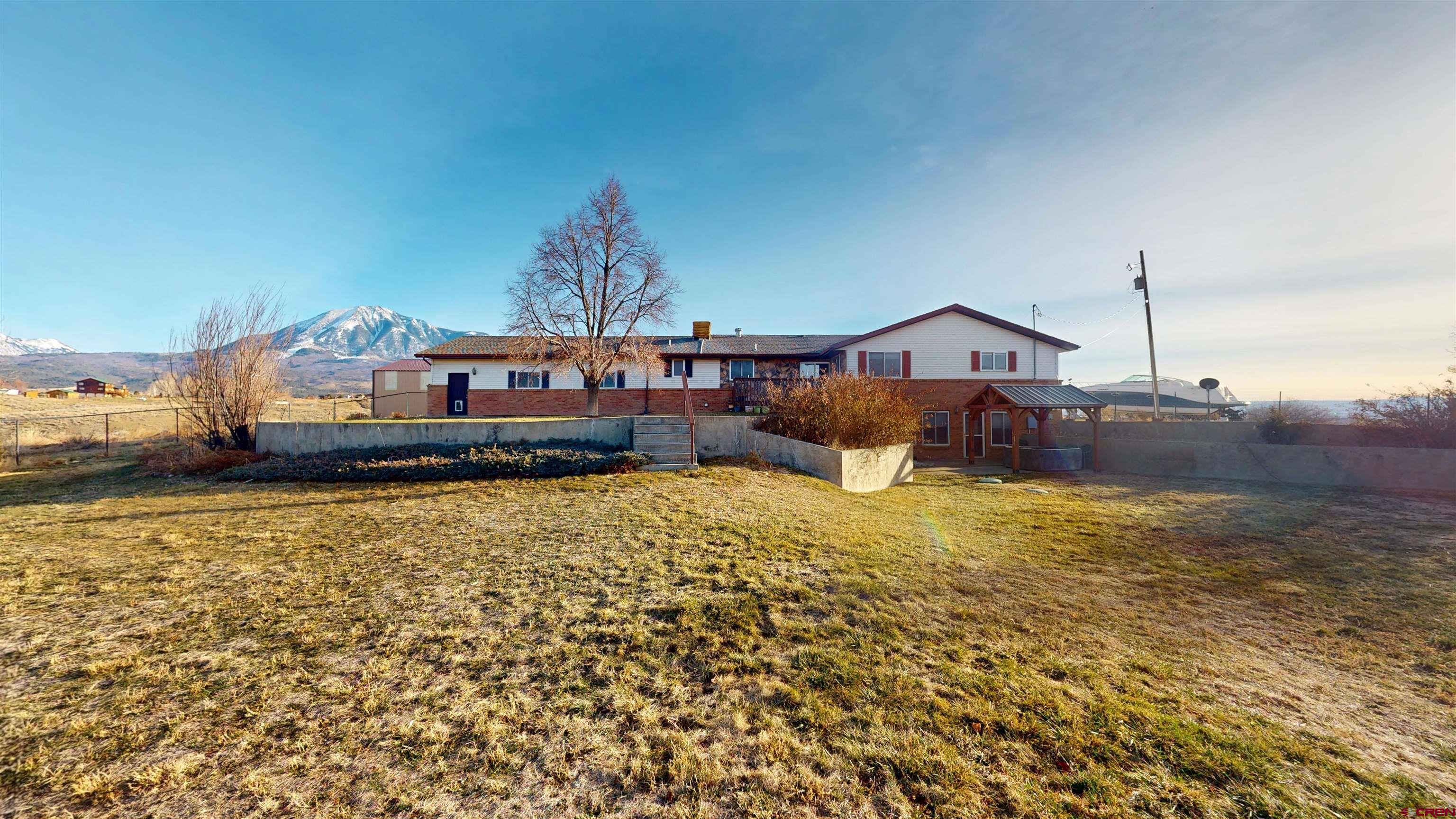 39865 Nelson Road Paonia, CO 81428 - Photo 6 of 38 a view of a house with a yard