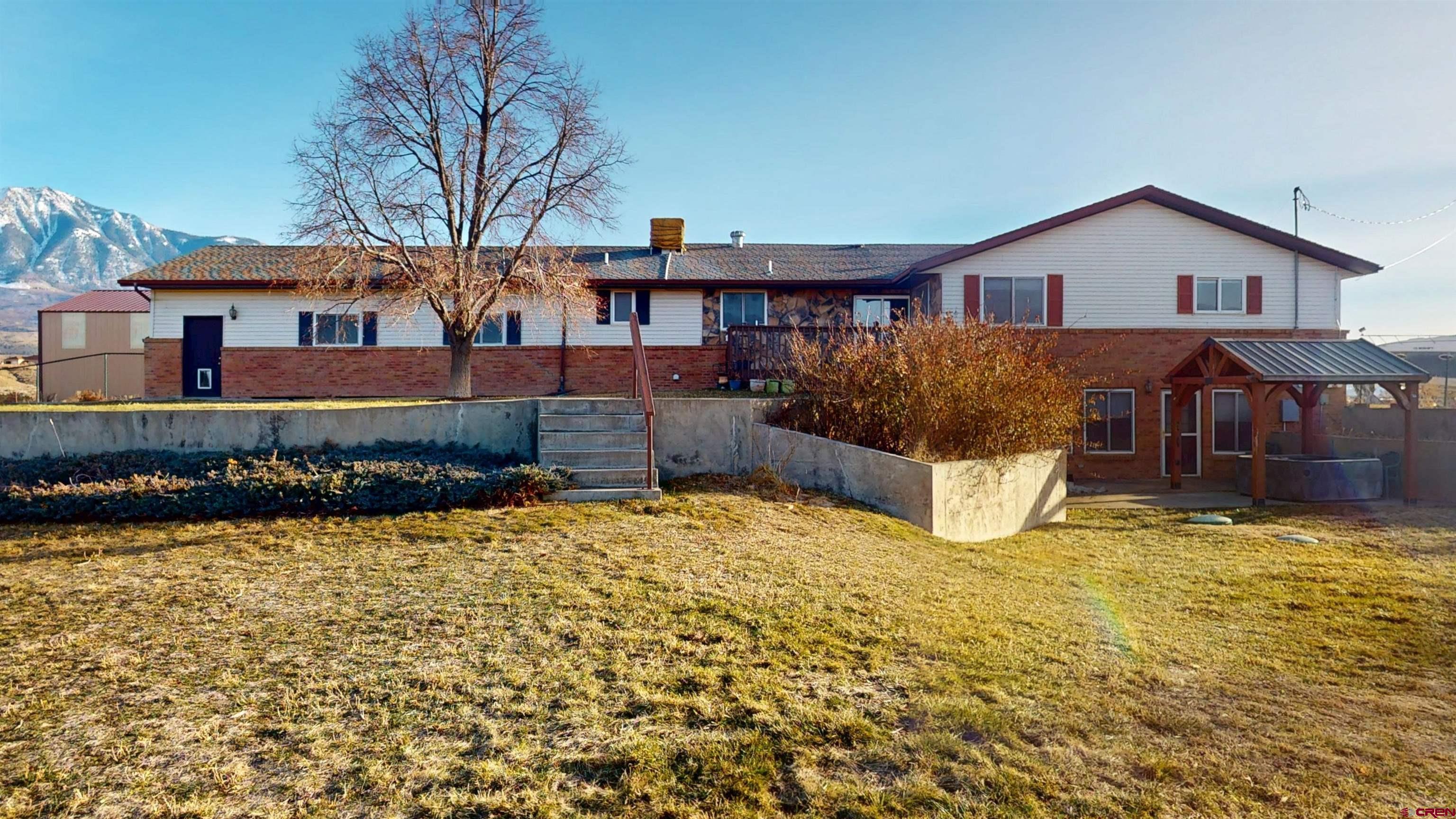 39865 Nelson Road Paonia, CO 81428 - Photo 7 of 38 a view of a house with a yard covered with snow in the balcony