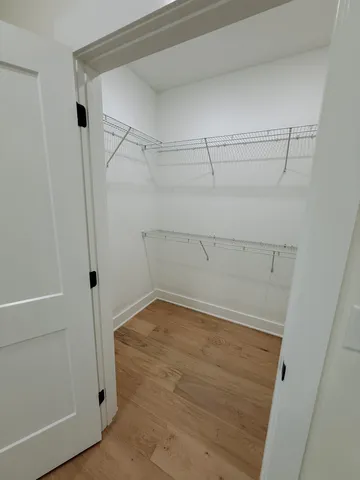 a view of a room with racks on the wall