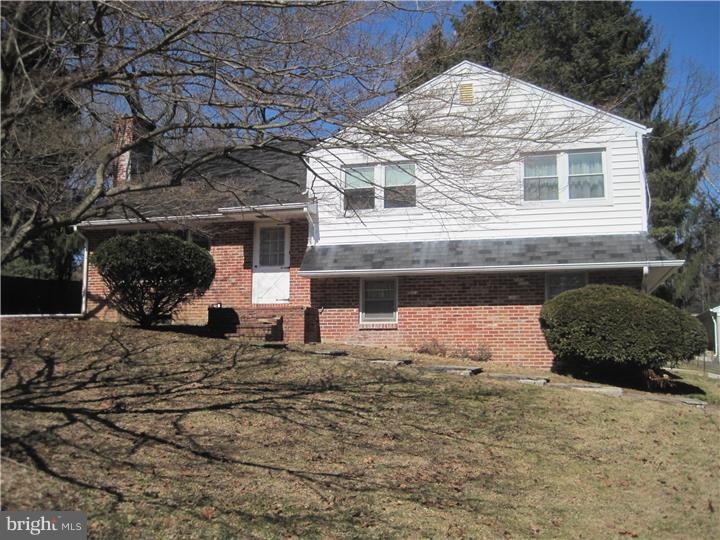 661 Upper Gulph Road Wayne, PA 19087 - Photo 1 of 2 a front view of a house with a yard