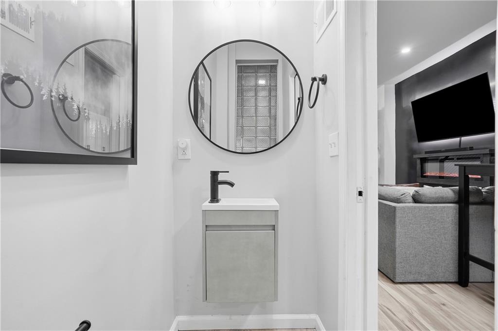 4615 Plummer Street Pittsburgh, PA 15201 - Photo 12 of 39 Half bathroom on main level.