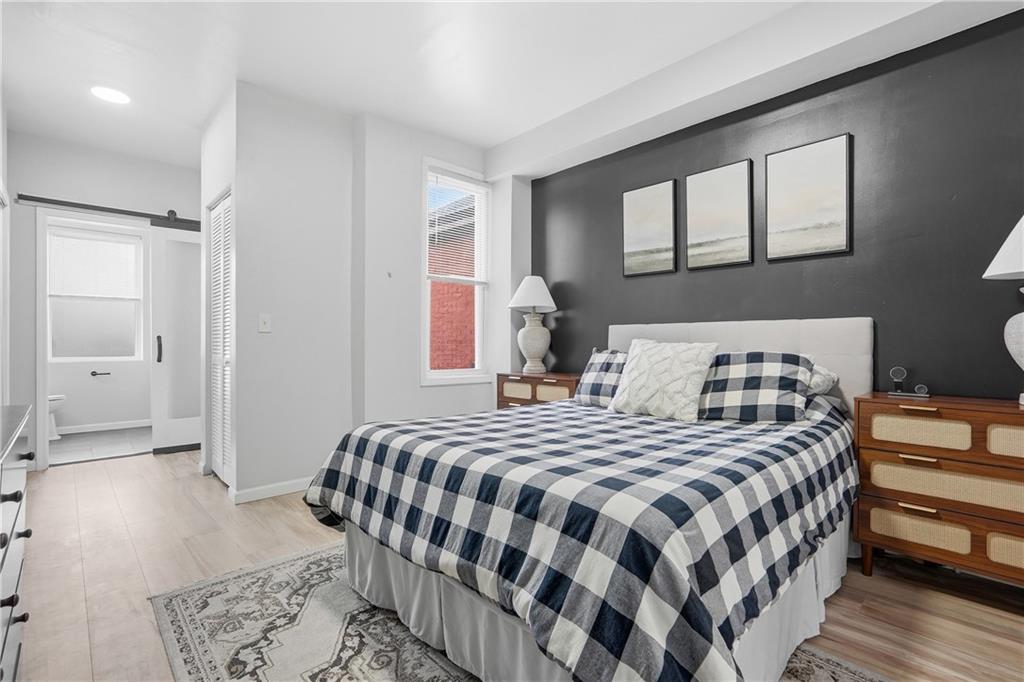 4615 Plummer Street Pittsburgh, PA 15201 - Photo 19 of 39 Spacious primary suite with dual closets.