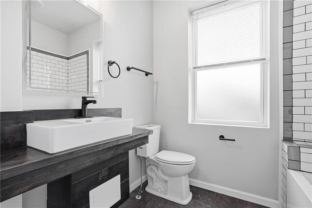4615 Plummer Street Pittsburgh, PA 15201 - Photo 22 of 39 Modern, updated primary bathroom.