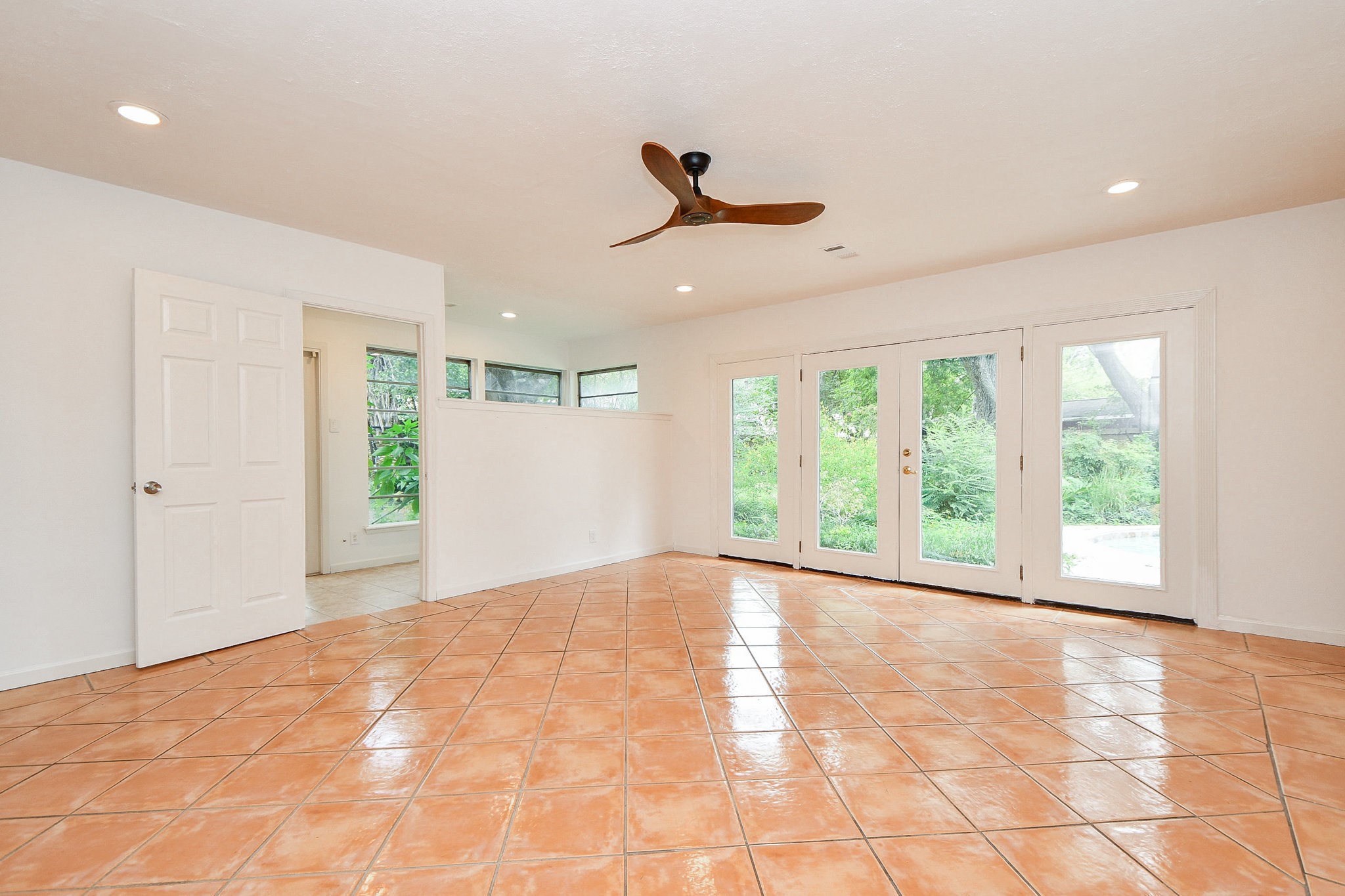 5015 Grape Street Houston, TX 77096 - Photo 12 of 28 a view of an empty room with a window
