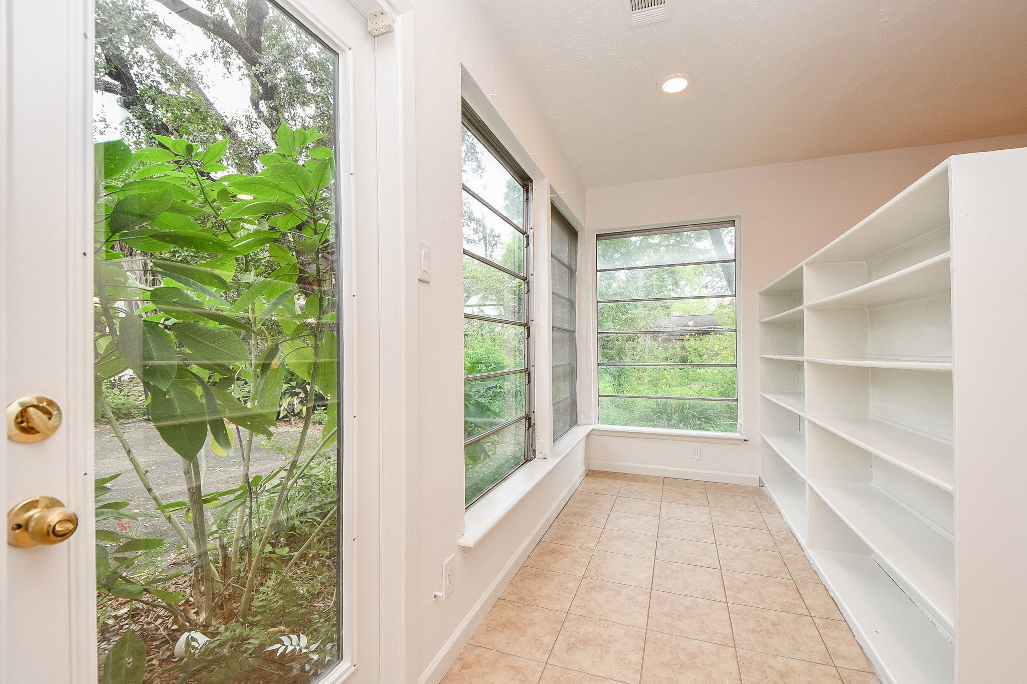 5015 Grape Street Houston, TX 77096 - Photo 14 of 28 a view of a garden from a windows