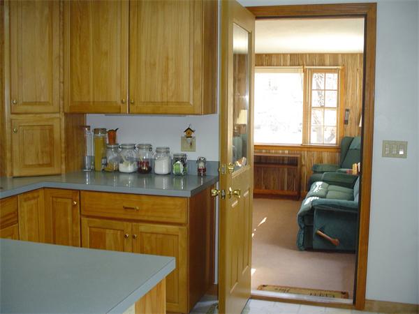 195 North Road Chelmsford, MA 01824 - Photo 7 of 17 a kitchen with stainless steel appliances granite countertop a sink a stove and a refrigerator