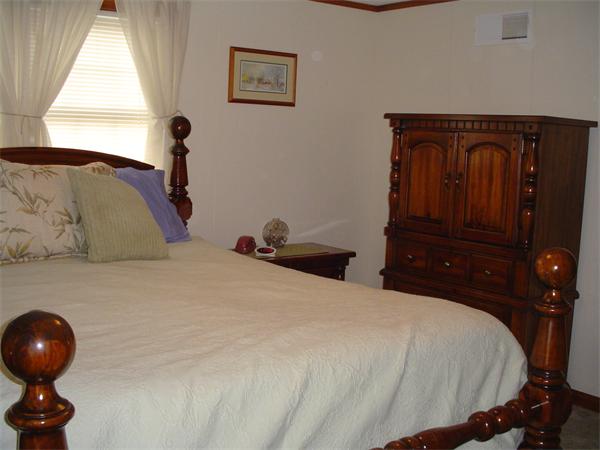 195 North Road Chelmsford, MA 01824 - Photo 10 of 17 a bedroom with a bed and a window