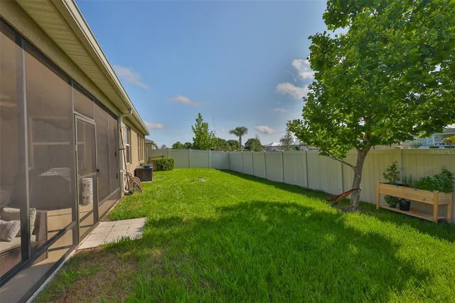a view of backyard with green space