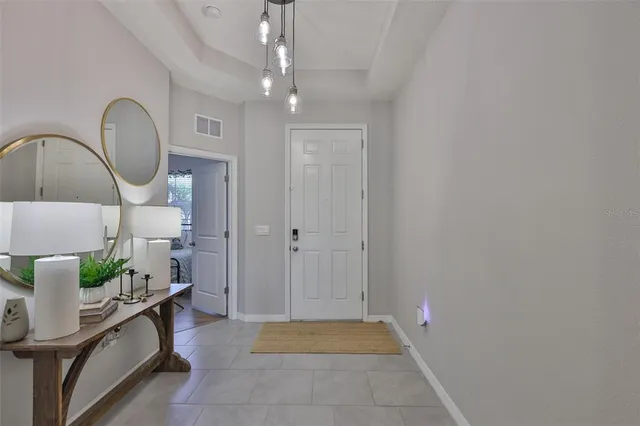 a view of entryway with kitchen