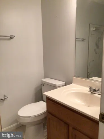 a bathroom with a shower and a glass door shower