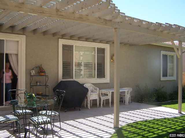2345 Keystone Avenue Reno, NV 89503 - Photo 3 of 9 a front view of a house with outdoor seating