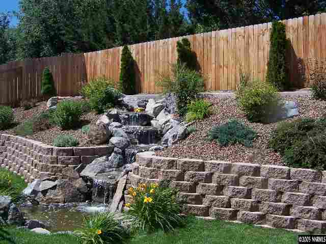 2345 Keystone Avenue Reno, NV 89503 - Photo 4 of 9 a garden with plants and wooden fence