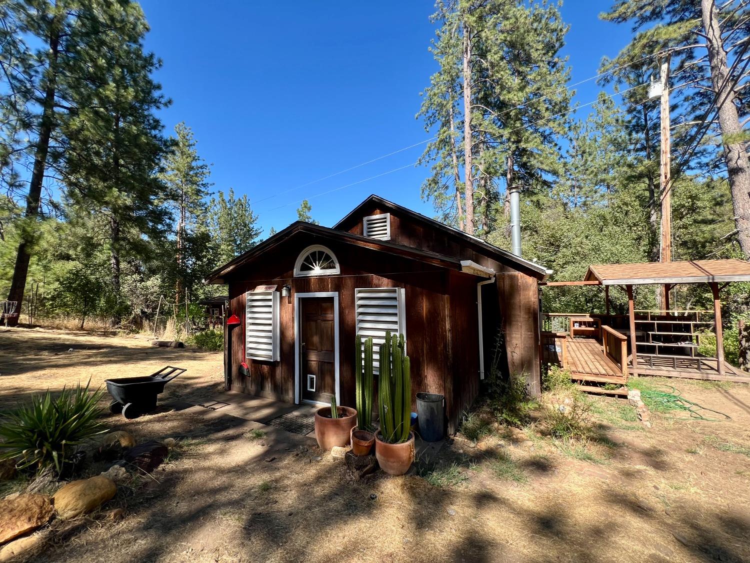 3201 Omo Ranch Road Somerset, CA 95684 - Photo 1 of 1 a view of a house with a yard