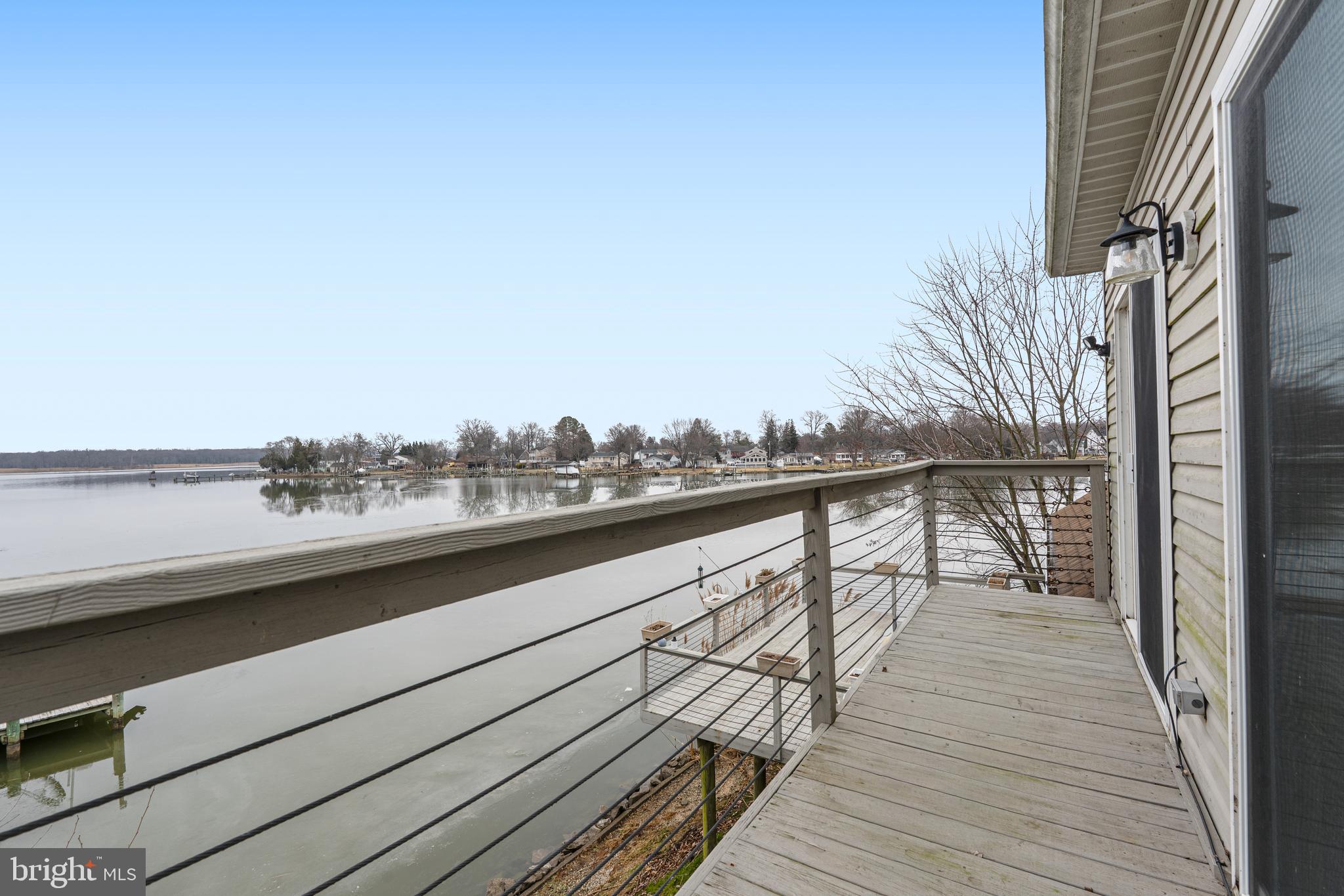6812 Schaadts Road, Unit 6812 Middle River, MD 21220 - Photo 13 of 54 a view of balcony and wooden floor