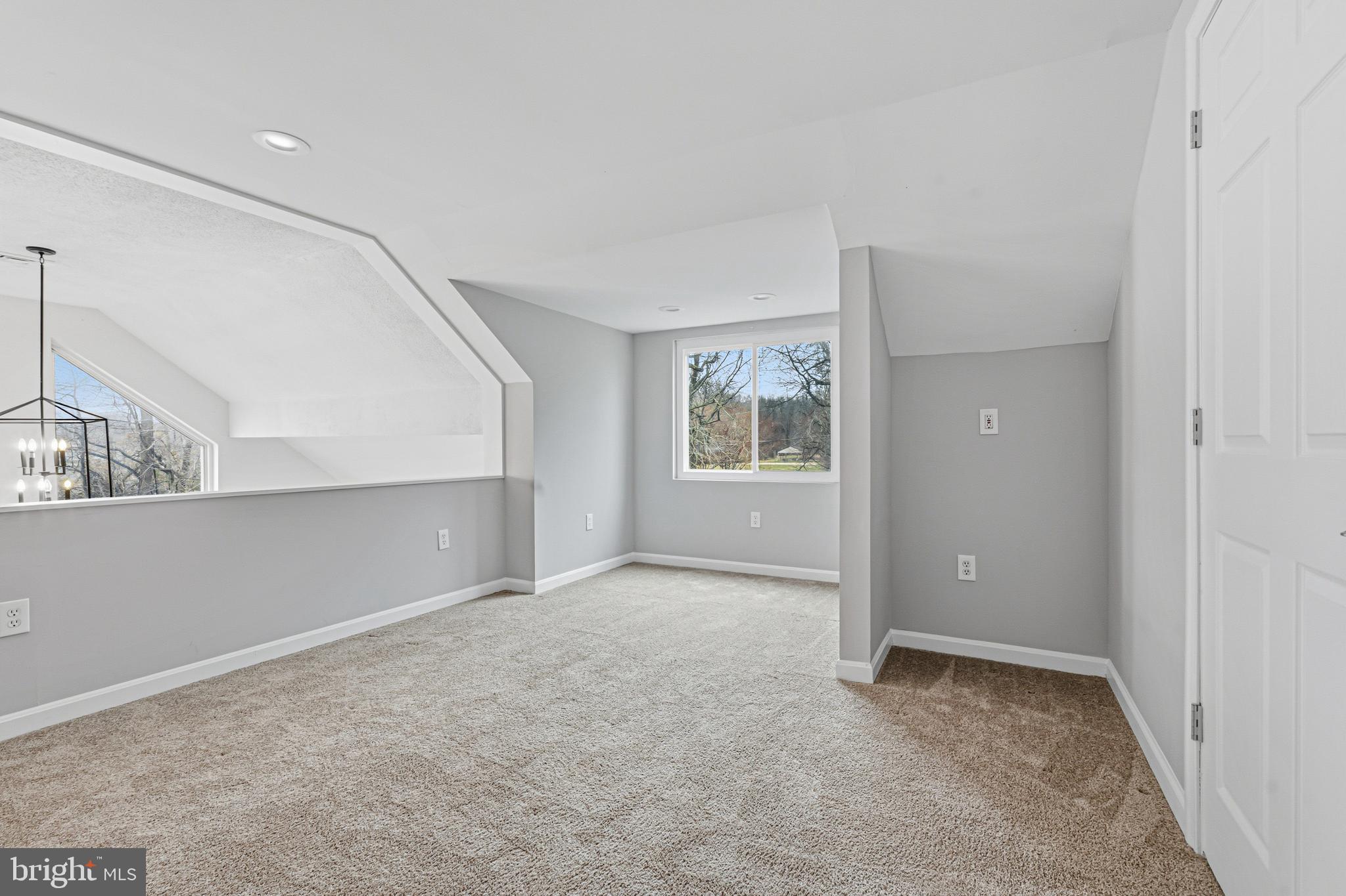 6812 Schaadts Road, Unit 6812 Middle River, MD 21220 - Photo 16 of 54 an empty room with windows and closet