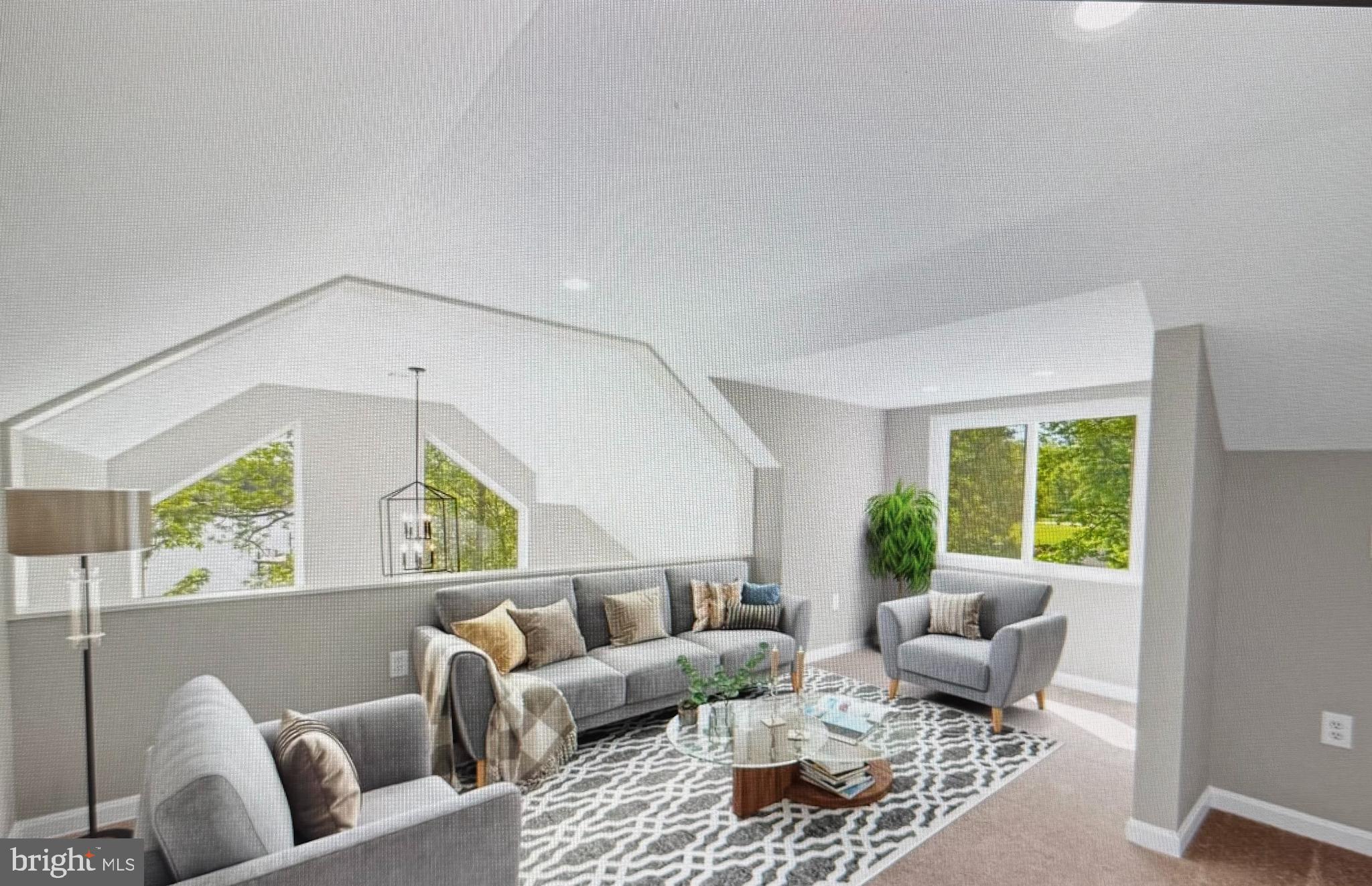 6812 Schaadts Road, Unit 6812 Middle River, MD 21220 - Photo 3 of 5 a living room with furniture and a large window