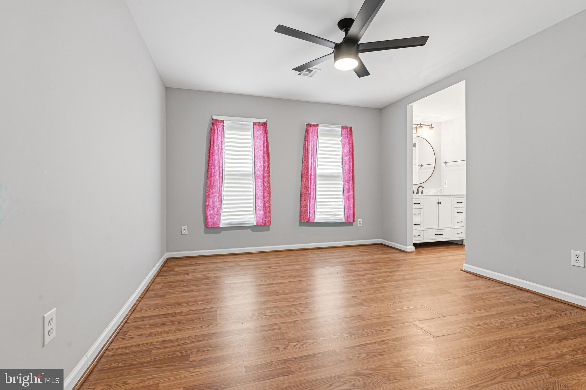 6812 Schaadts Road, Unit 6812 Middle River, MD 21220 - Photo 32 of 54 wooden floor in an empty room with a window