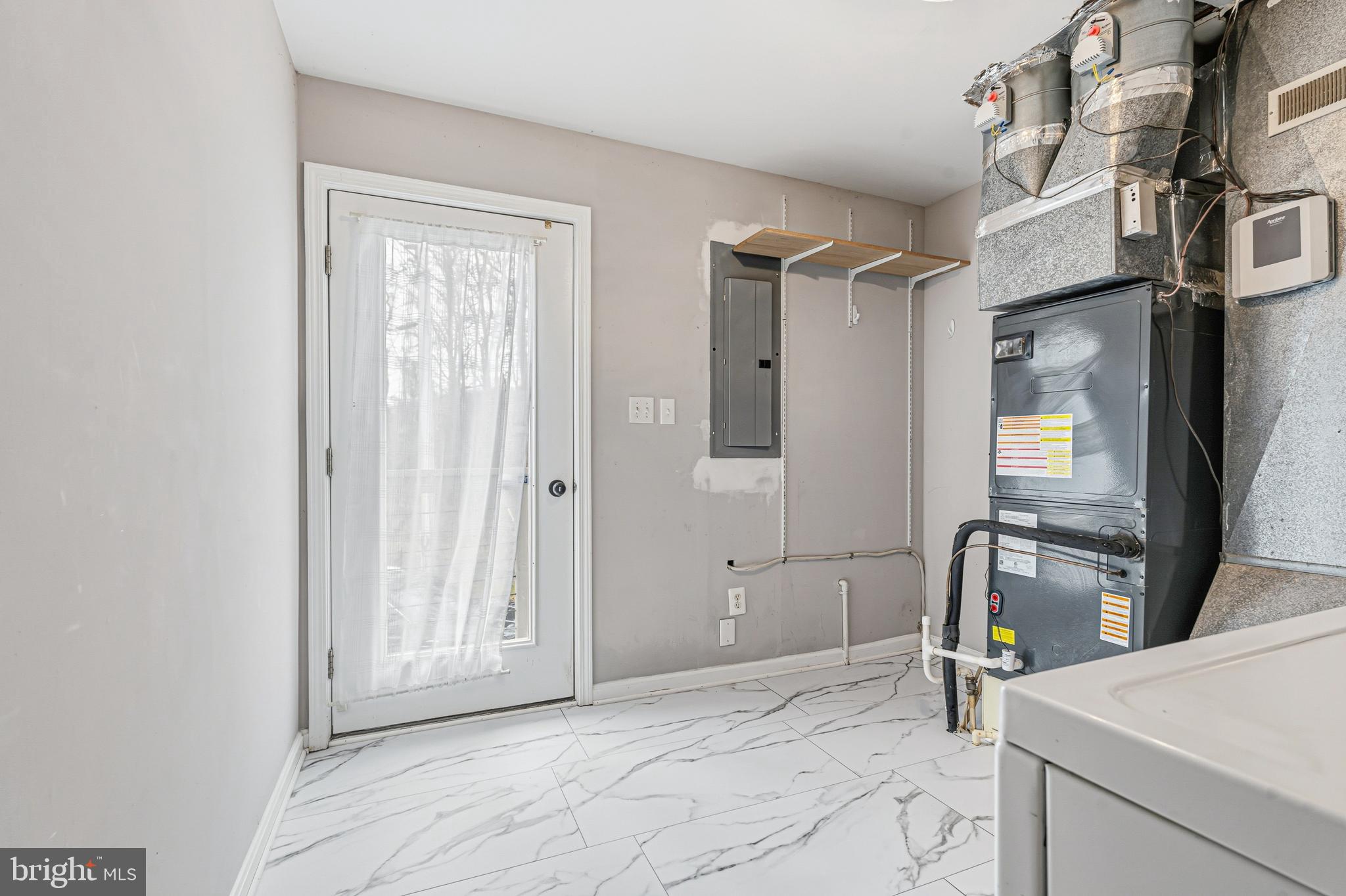 6812 Schaadts Road, Unit 6812 Middle River, MD 21220 - Photo 35 of 54 a view of utility room