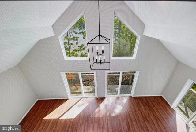 a view of front door of house with stairs