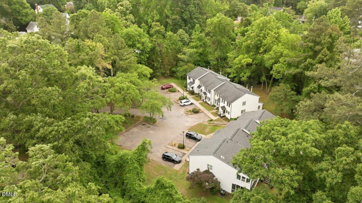 2834 Wayland Drive Raleigh, NC 27608 - Photo 23 of 26 an aerial view of a house with a yard and large trees