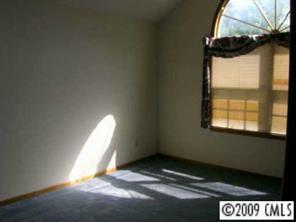 12616 Newstead Road Huntersville, NC 28078 - Photo 4 of 8 a view of an empty room and window