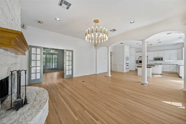a view of a livingroom with wooden floor