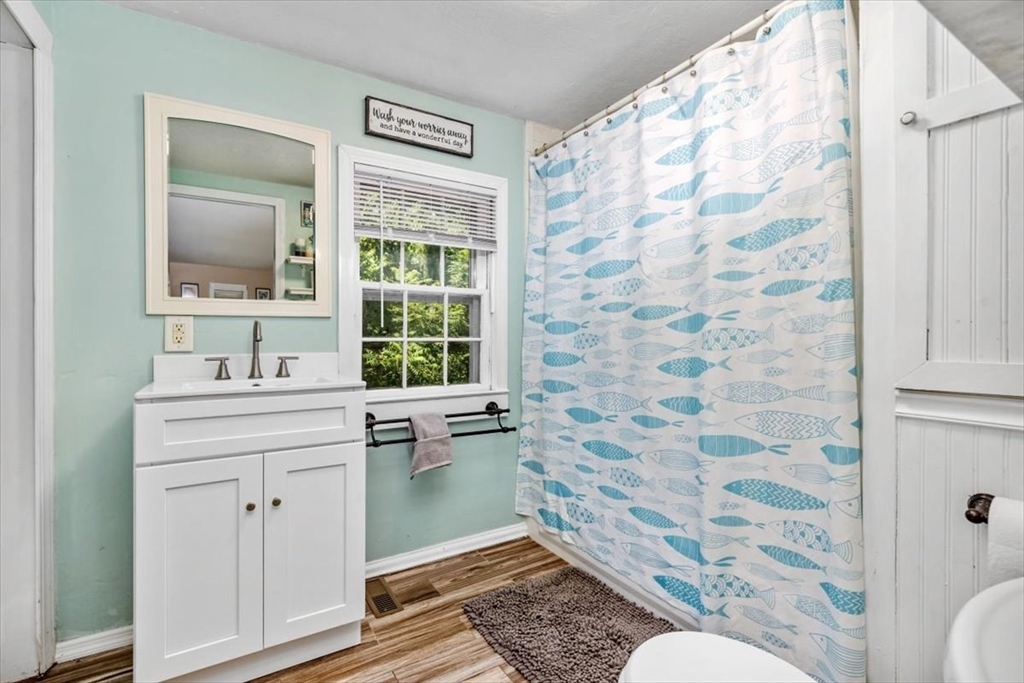 142 Tilden Road Scituate, MA 02066 - Photo 4 of 28 a bathroom with a sink toilet and shower