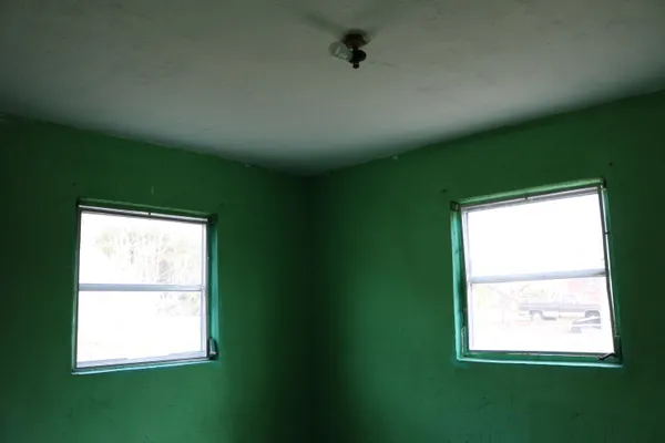 a view of a room that has a window in it