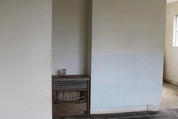 a kitchen with a stove and a microwave
