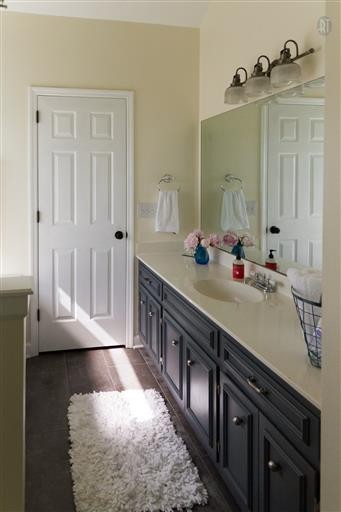 1766 Witt Way Drive Spring Hill, TN 37174 - Photo 10 of 13 a bathroom with a double vanity sink and a mirror