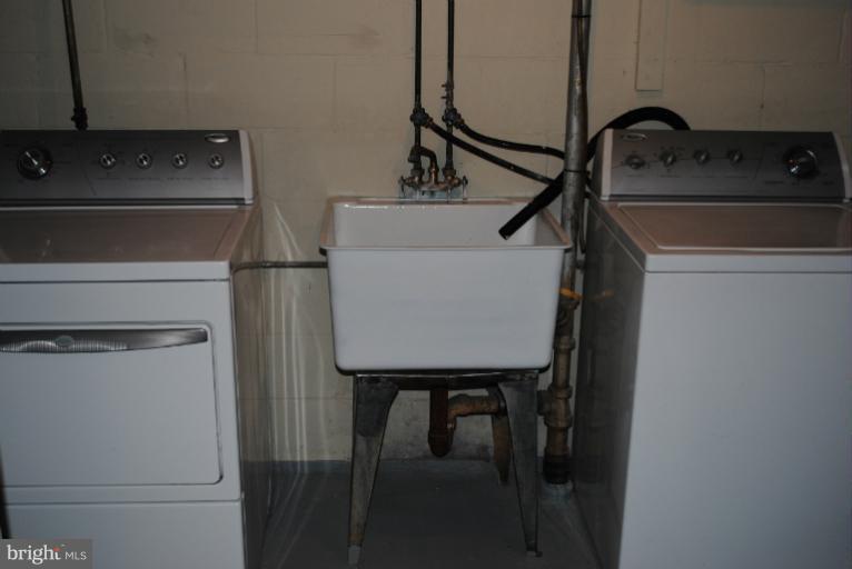 6206 Radecke Avenue Baltimore, MD 21206 - Photo 16 of 22 a close view of a sink and cabinets