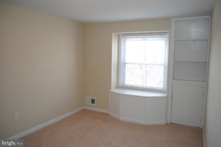 6206 Radecke Avenue Baltimore, MD 21206 - Photo 17 of 22 an empty room with a window