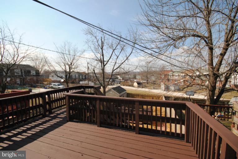 6206 Radecke Avenue Baltimore, MD 21206 - Photo 4 of 22 a view of wooden deck with a yard