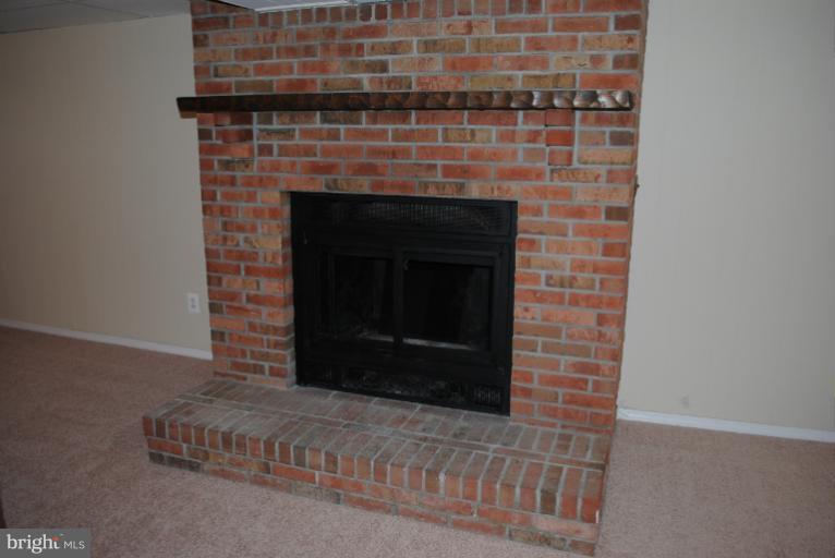6206 Radecke Avenue Baltimore, MD 21206 - Photo 6 of 22 a brick oven with a fireplace