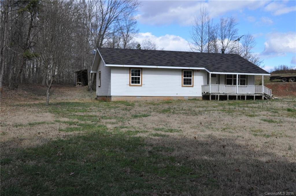 527 Floyd Blackwell Road, Unit A Tryon, NC 28782 - Photo 1 of 13 a house view with a outdoor space