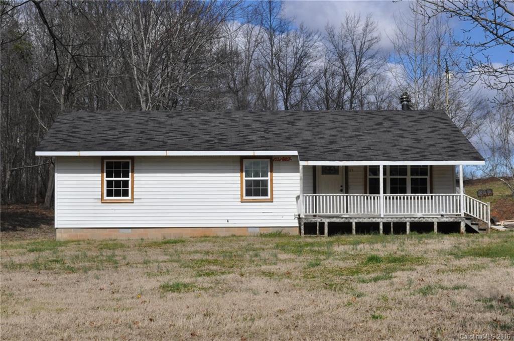 527 Floyd Blackwell Road, Unit A Tryon, NC 28782 - Photo 2 of 13 front view of a house with a yard