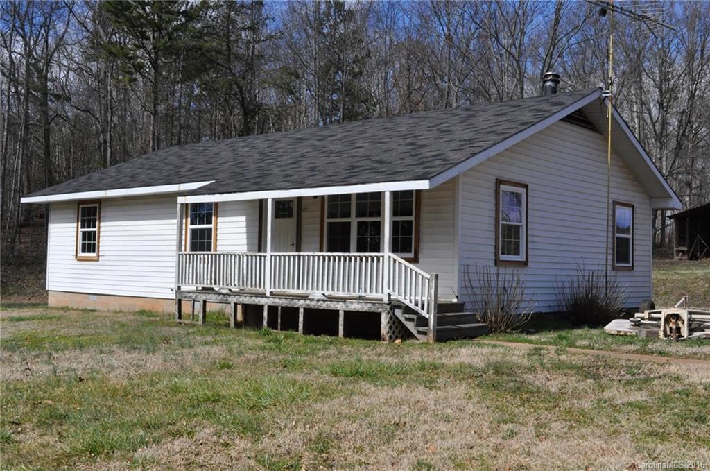 527 Floyd Blackwell Road, Unit A Tryon, NC 28782 - Photo 4 of 13 a view of a house with backyard