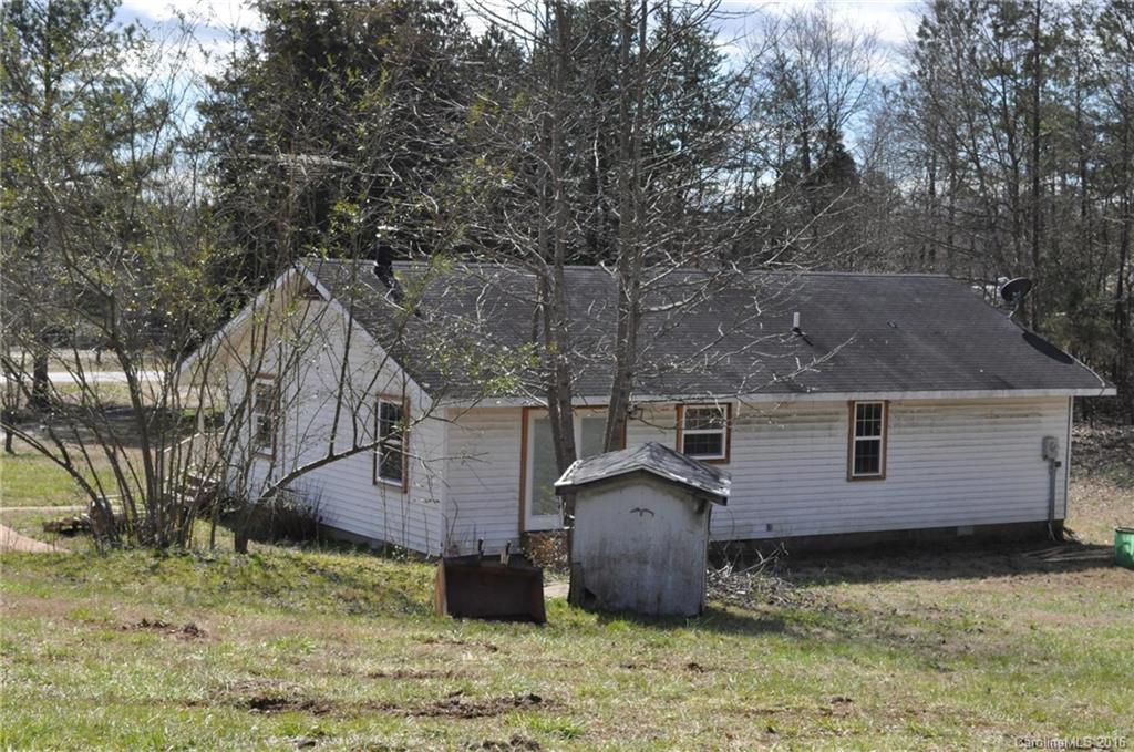 527 Floyd Blackwell Road, Unit A Tryon, NC 28782 - Photo 5 of 13 a view of a house with a yard
