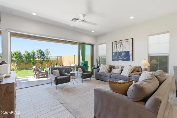 a view of chairs and table in patio