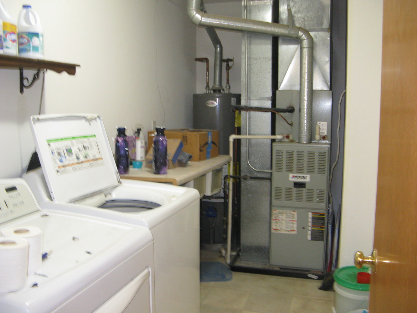 574 Boulder Drive Morris, IL 60450 - Photo 14 of 14 a utility room with dryer and washer
