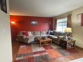 574 Boulder Drive Morris, IL 60450 - Photo 2 of 14 a living room with furniture and wooden floor