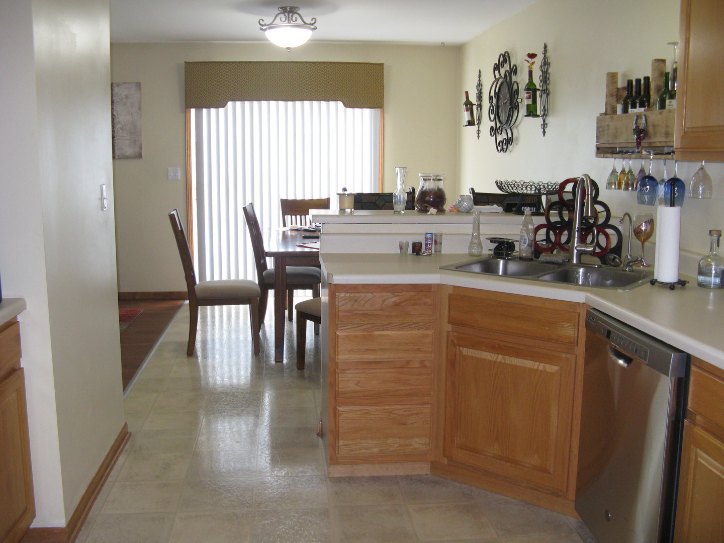 574 Boulder Drive Morris, IL 60450 - Photo 6 of 14 a kitchen with cabinets and window