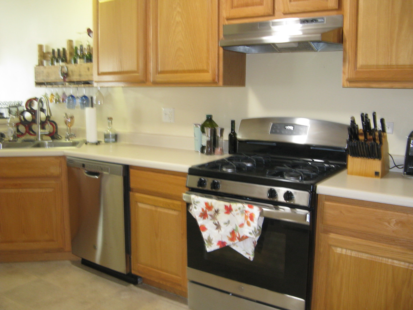 574 Boulder Drive Morris, IL 60450 - Photo 7 of 14 a kitchen with stainless steel appliances granite countertop a stove and a microwave