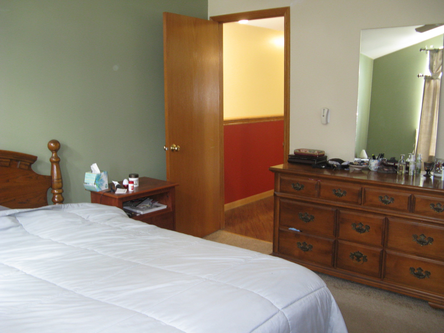 574 Boulder Drive Morris, IL 60450 - Photo 10 of 14 a bedroom with a bed and a dresser