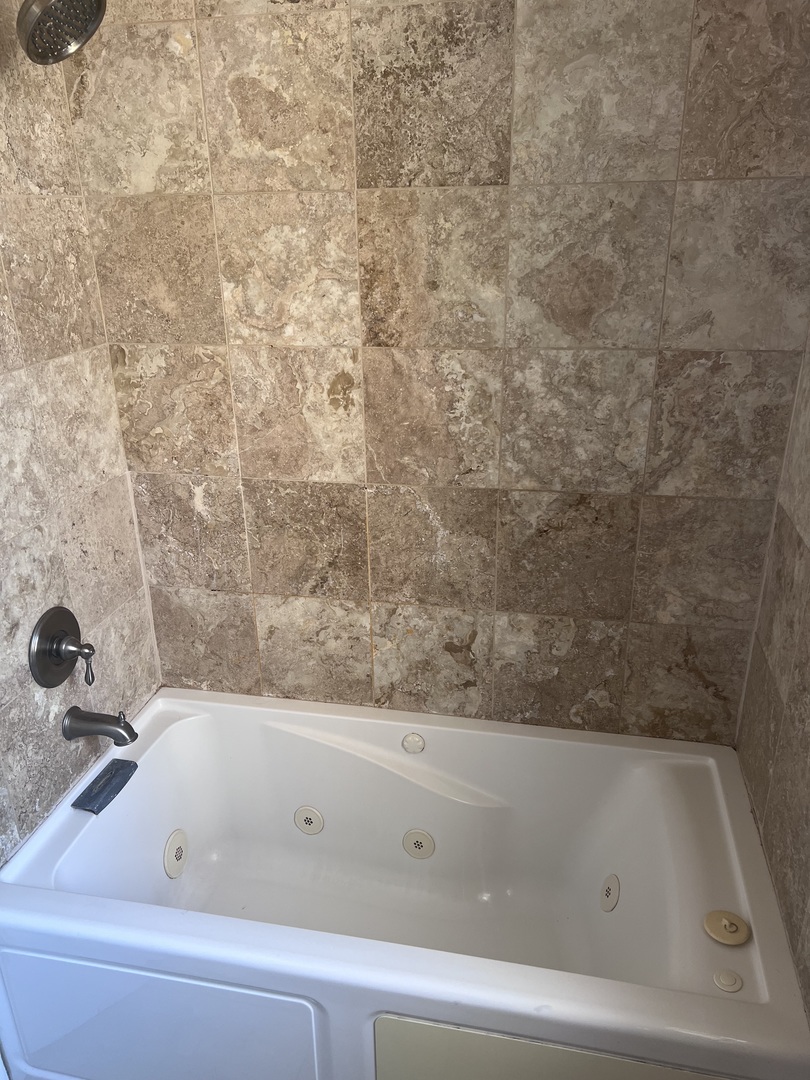 Undisclosed Address Chicago, IL 60622 - Photo 15 of 16 a bathroom with a bathtub