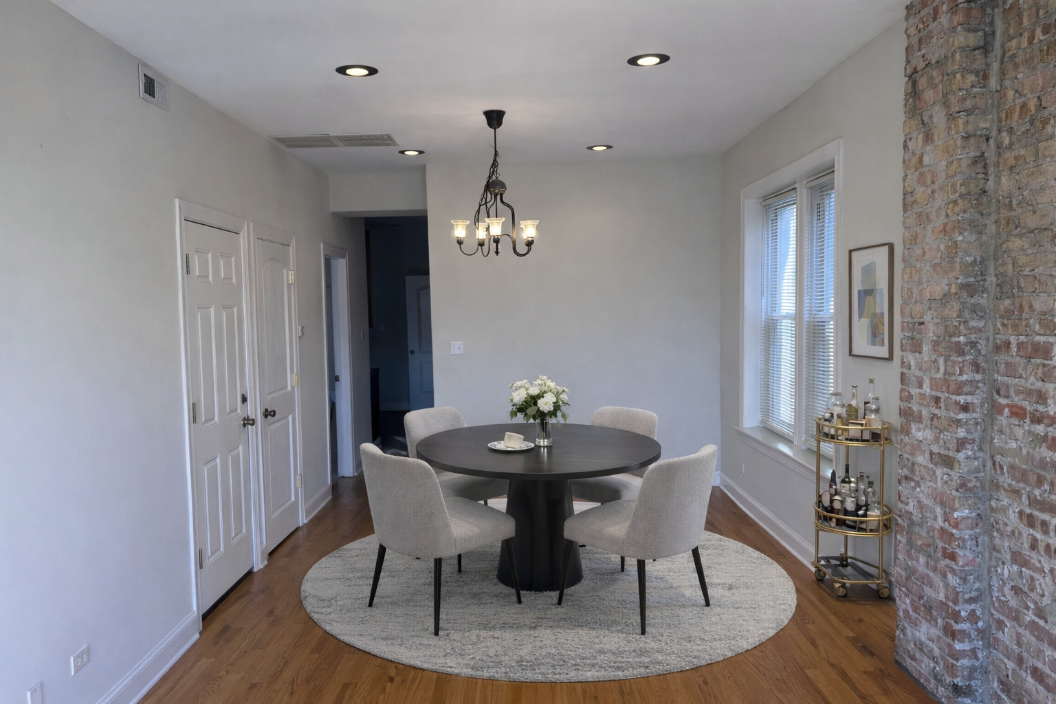 Undisclosed Address Chicago, IL 60622 - Photo 6 of 16 a dining room with a table and chairs
