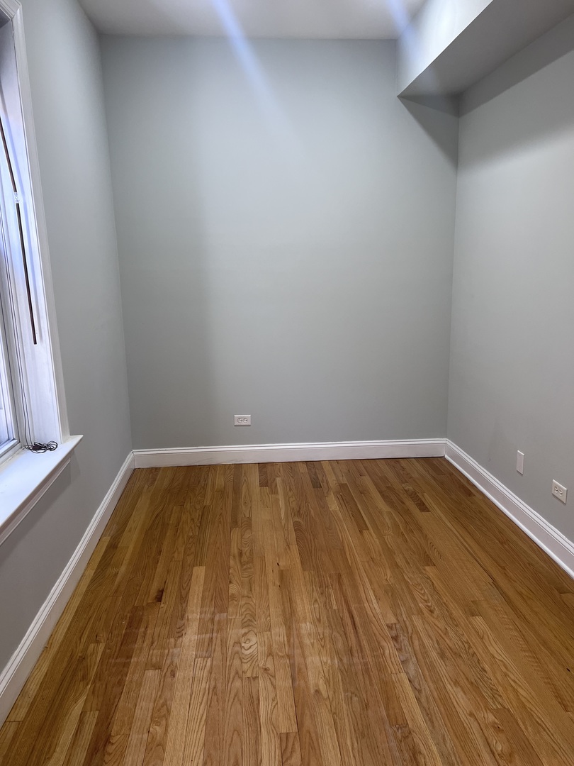 Undisclosed Address Chicago, IL 60622 - Photo 10 of 16 a view of wooden floor in a room