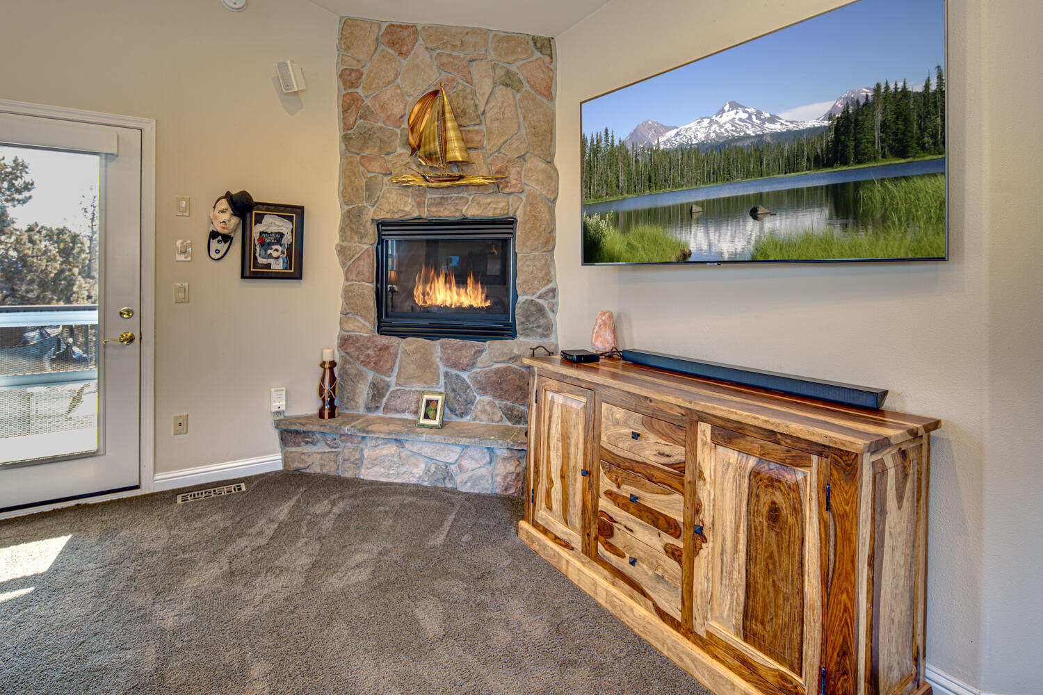 66250 Gerking Market Road Bend, OR 97703 - Photo 28 of 86 a view of a livingroom with furniture and a flat screen tv