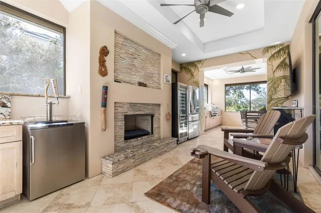 a view of a backyard with sitting area