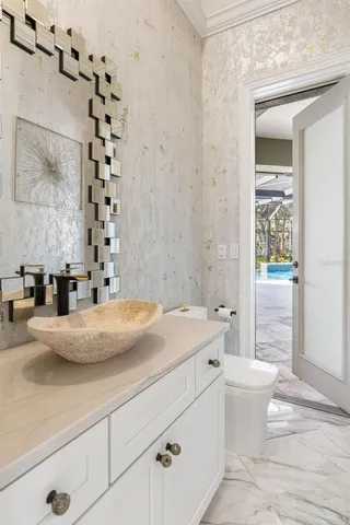 a spacious bathroom with a bathtub sink and toilet